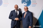 Ángel Gurría, President of the Paris Peace Forum, welcomes Prince Rahim to the 6th edition of the Forum at the Palais Brongniart